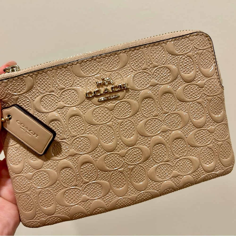 Coach Embossed Monogram Wristlet